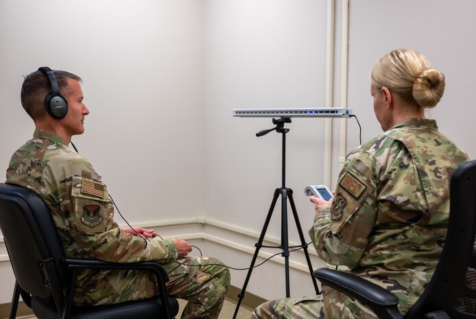 U.S. Air Force Brig. Gen. Stephen Snelson, U.S. Air Force Expeditionary Center commander, receives a neuropsychological testing demonstration from Maj. Elizabeth Copeland, 628th Medical Group Behavioral Health flight commander, during a visit to Joint Base Charleston, South Carolina, Oct. 29, 2024. The USAFEC command team engaged with Airmen and Sailors across the installation, observing firsthand their innovative approaches to enhancing mission success and operational readiness. (U.S. Air Force photo by Senior Airman Christian Silvera)