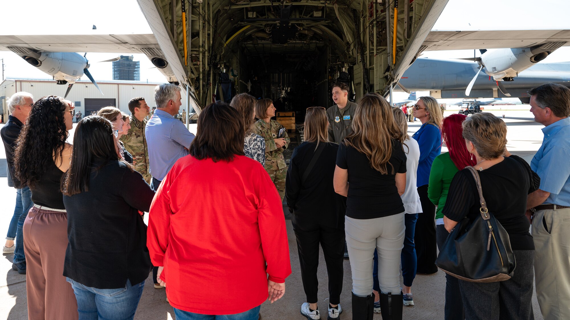 Airmen from Dyess Air Force Base talk with Abilene medical personnel about the C-130J Super Hercules at Dyess AFB, Texas, Oct. 25, 2024. A variety of static display stations were used to demonstrate the Dyess mission and how local medical facilities impact Airmen. (U.S. Air Force photo by Airman 1st Class Jade M. Caldwell)