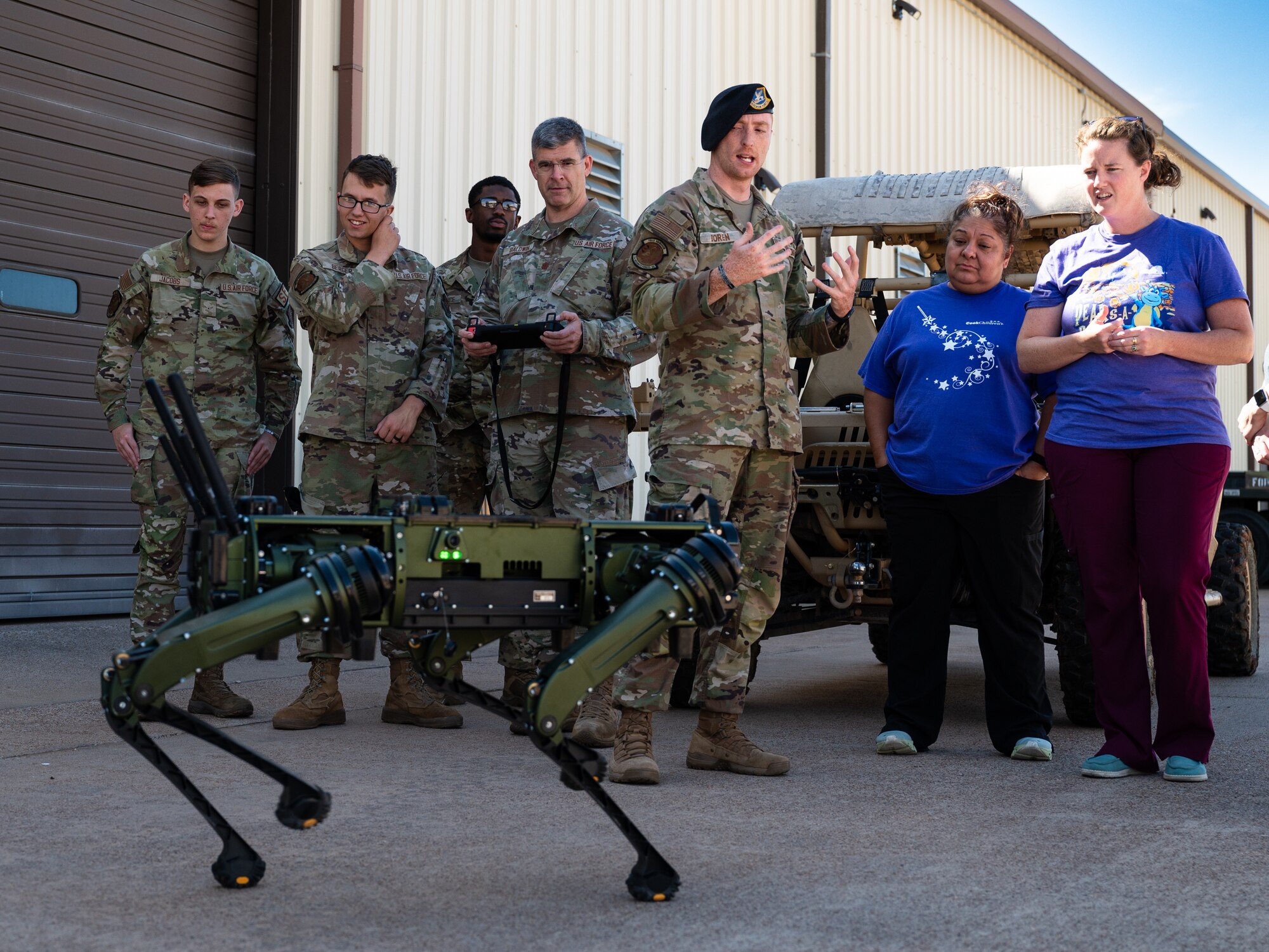 Airmen from the 7th Security Forces demonstrate the Quadrupedal Unmanned Ground Vehicle capabilities to Abilene medical personnel and members from the 7th Medical Group at Dyess Air Force Base, Texas, Oct. 25, 2024. The presentation of Dyess capabilities opened a discussion on the conditions Airmen go through and how local medical facilities support the mission. (U.S. Air Force photo by Airman 1st Class Jade M. Caldwell)