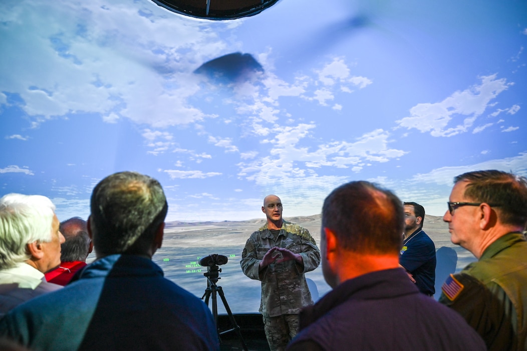 Greater San Antonio area civic leaders enter the virtual augmented reality simulation room for tactical air control party (TACP) specialist training at Nellis Air Force Base, Nevada, Oct. 23, 2024.