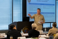 Rear Adm. Walter Brafford, commander of the Naval Medical Forces Development Command, addresses attendees at this year's NMFDC's annual commander's conference at Joint Base San Antonio, Texas, Oct. 22-23, 2024. The conference brought NMFDC Region leaders together to discuss how the can leverage innovation and technology to better develop and deliver trained medical forces to the U.S. Navy. (U.S. Navy photo by Malcolm McClendon)