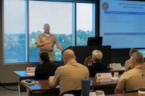 Capt. Richard B. Lawrence, commanding officer of the Navy Medicine Training Support Command, addresses attendees at this year's Naval Medical Forces Development Command annual commander's conference at Joint Base San Antonio, Texas, Oct. 22-23, 2024. The conference brought NMFDC Region leaders together to discuss how the can leverage innovation and technology to better develop and deliver trained medical forces to the U.S. Navy. (U.S. Navy photo by Malcolm McClendon)