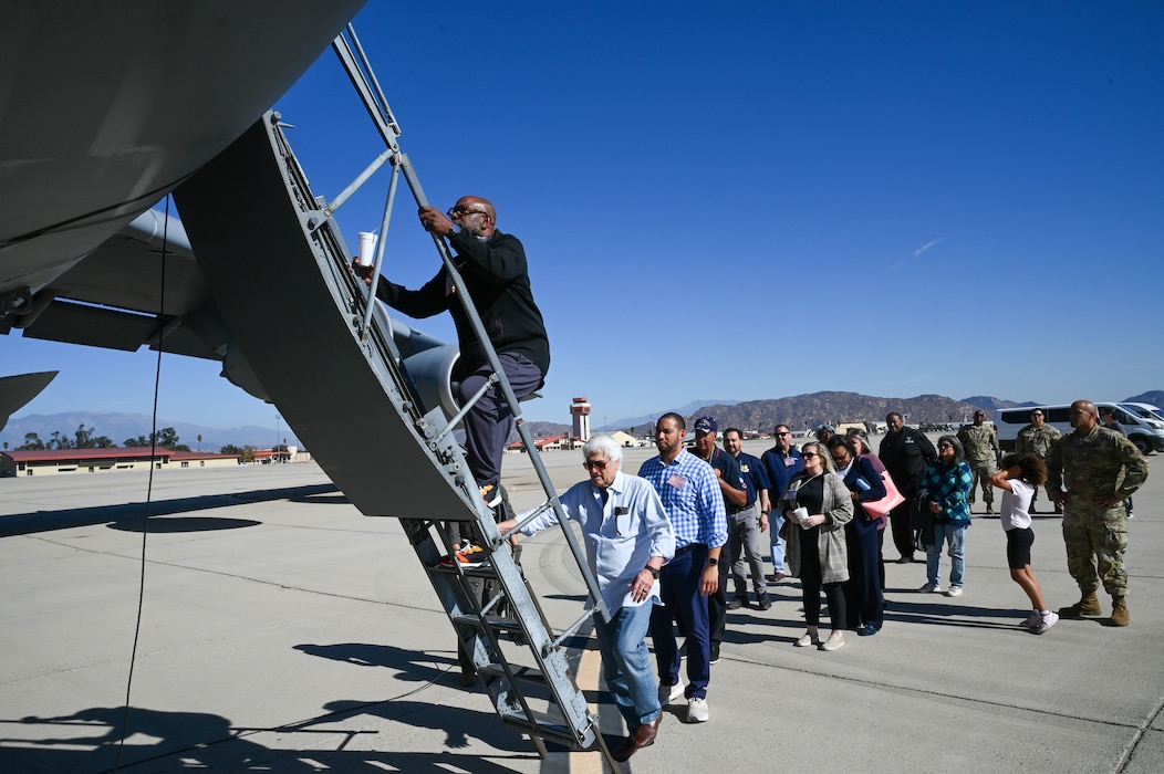 Greater San Antonio area civic leaders board onto a 433rd Airlift Wing C-5M Super Galaxy to fly back home after a civic leader tour at March Air Reserve Base, Calif., Oct. 24, 2024.