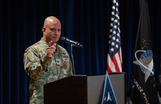  U.S. Space Force Col. Raj Agrawal, Mission Delta 2 commander, delivers remarks to audience members during the Mission Delta 2 redesignation ceremony, Oct. 31, 2024. Mission Deltas oversee all aspects of mission area functions – people, training, equipment and combat sustainment.