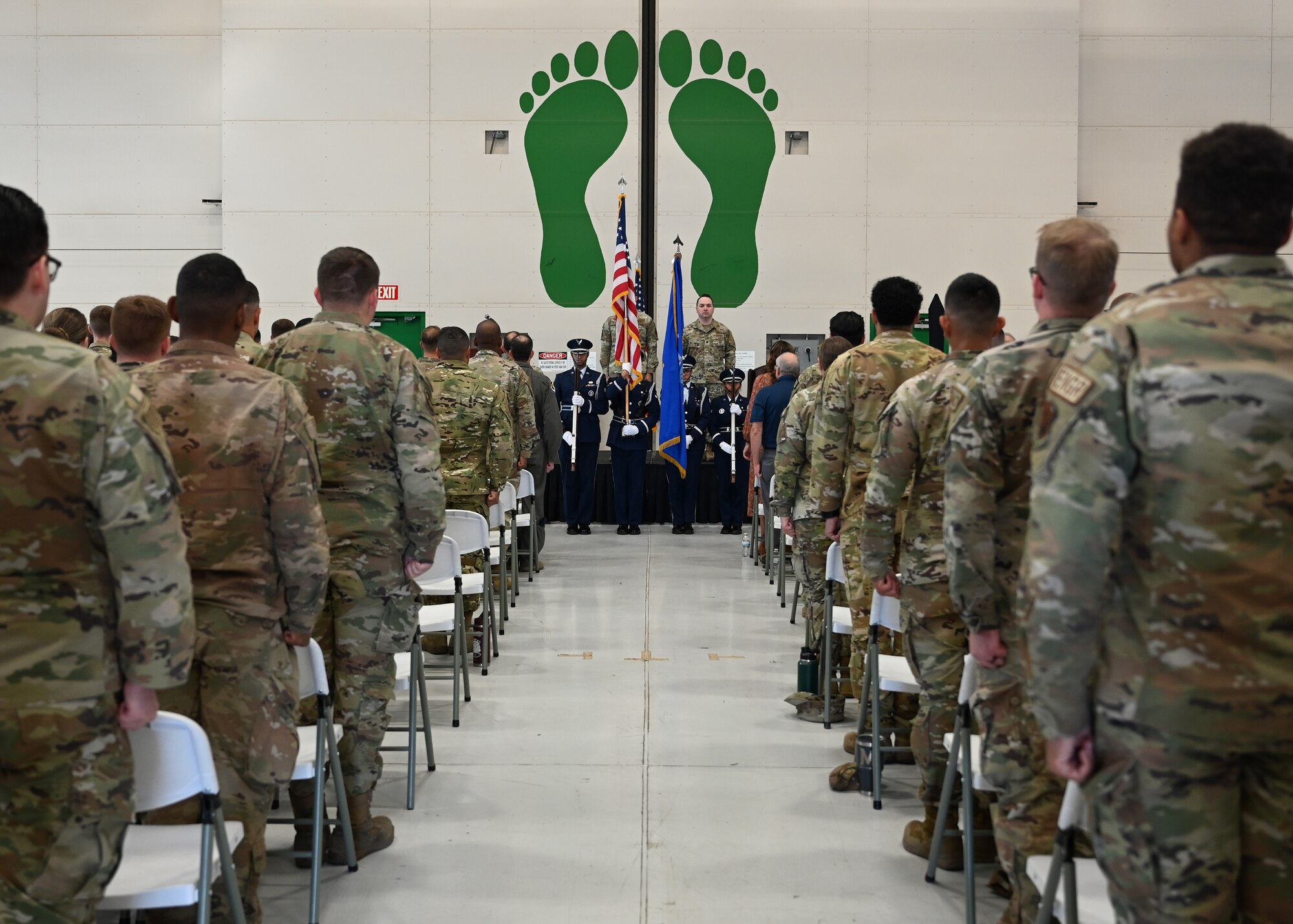 Davis-Monthan Honor Guard presents the colors at the activation and assumption of command for the 11th Combat Air Base Squadron at Davis-Monthan Air Force Base, Arizona, Oct. 31, 2024. The 11th CABS is an elite squadron designed to execute flexible and uncharted mission directives, worldwide. (U.S. Air Force photo by Staff Sgt. Abbey Rieves)