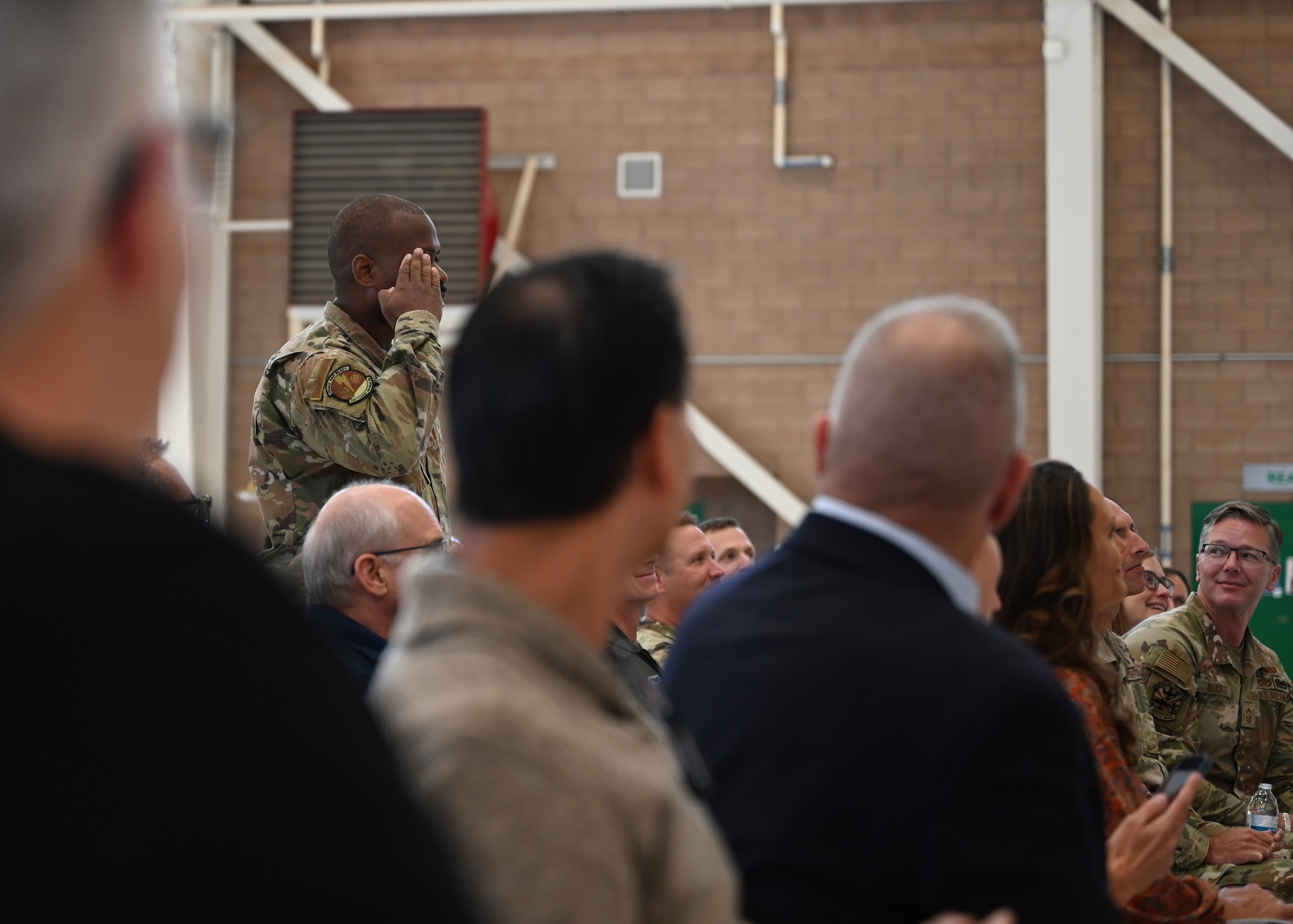 U.S. Air Force Chief Master Sgt. Jerome Clark, 11th Combat Air Base Squadron command chief, renders the first salute at the activation and assumption of command for the 11th Combat Air Base Squadron at Davis-Monthan Air Force Base, Arizona, Oct. 31, 2024. Airmen assigned to the 11th CABS will train, prepare and deploy together, delivering combat capabilities to the joint force. (U.S. Air Force photo by Staff Sgt. Abbey Rieves)