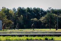 Airmen and JGSDF members runs to cover