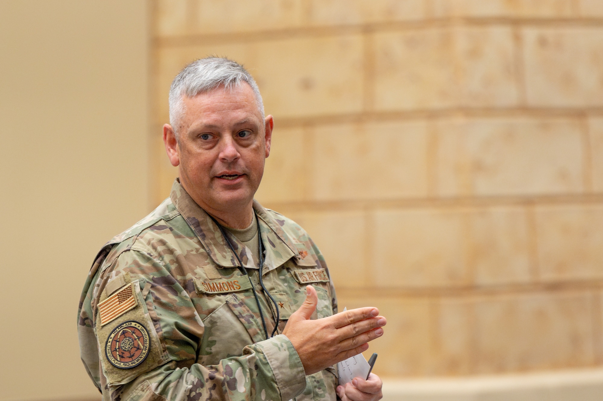 U.S. Air Force Brig. Gen. Corey Simmons, Air Mobility Command director of strategy, plans, requirements, and programs, talks to industry representatives during the Fall Industry Preview Oct. 30, 2024, in Grapevine, Texas. Fall Industry Preview provides a platform for industry partners to present AMC leaders potential advancements and solutions, strengthening partnerships to prevail in an era of Great Power Competition. (U.S. Air Force photo by Chris Bishop)