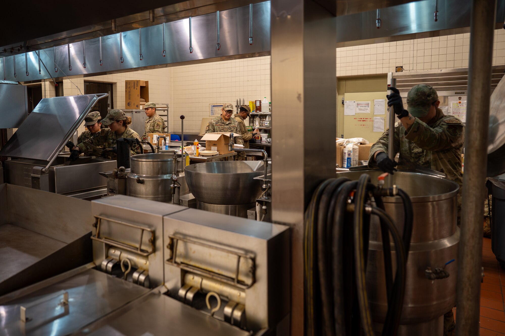 U.S. Air Force Airmen assigned to the 51st Force Support Squadron execute contingency services during Beverly Herd 25-1 at Osan Air Base, Republic of Korea, Nov. 1, 2024. This operation marks the first time in recent training events that the squadron has activated an alternate dining facility, ensuring Airmen are prepared to sustain operations in diverse contingent environments. (U.S. Air Force photo by Senior Airman Brittany Russell)