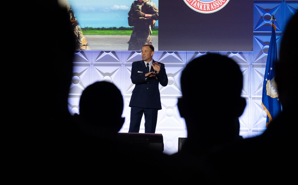 U.S. Air Force Gen. Johnny Lamontagne, Air Mobility Command commander, speaks to nearly 1000 Airmen during the 56th Annual Airlift/Tanker Association Symposium, Oct. 31, 2024, in Grapevine, Texas. Lamontagne kicked off the symposium introducing his commander’s intent and bucketing it into three focus areas: Airmen, mission, and commitment. (U.S. Air Force photo by Staff Sgt. Dalton Williams)