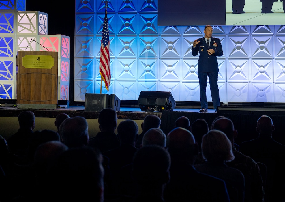 U.S. Air Force Gen. Johnny Lamontagne, Air Mobility Command commander, speaks to nearly 1000 Airmen during the 56th Annual Airlift/Tanker Association Symposium, Oct. 31, 2024, in Grapevine, Texas. Lamontagne kicked off the symposium introducing his commander’s intent and bucketing it into three focus areas: Airmen, mission, and commitment. (U.S. Air Force photo by Staff Sgt. Dalton Williams)