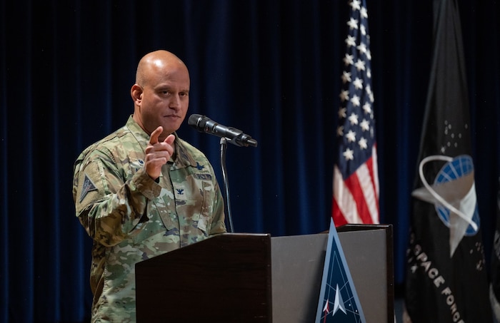 U.S. Space Force Col. Raj Agrawal, Mission Delta 2 commander, delivers remarks to audience members during the Mission Delta 2 redesignation ceremony, Oct. 31, 2024. Mission Deltas oversee all aspects of mission area functions – people, training, equipment and combat sustainment.