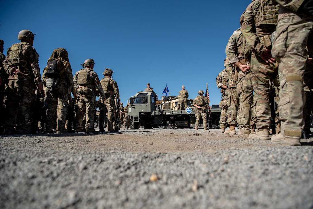 Airmen from the Kentucky Air National Guard’s 123rd Contingency Response Group attend a change-of-command ceremony at Amedee Army Airfield, Calif., Aug. 26, 2024. The ceremony took place at the end of a week-long exercise that tested the 123rd CRG’s capability to conduct a Joint Task Force-Port Opening, an operation designed to safely and effectively distribute cargo and supplies to austere areas affected by catastrophic events or conflict. (U.S. Air National Guard photo by Master Sgt. Joshua Horton)