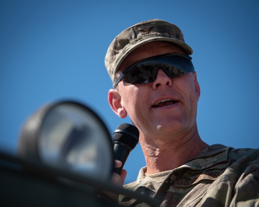 Col. Ryan Adams, outgoing commander of the Kentucky Air National Guard’s 123rd Contingency Response Group, speaks during a change-of-command ceremony at Amedee Army Airfield, Calif., Aug. 26, 2024, in which Lt. Col. Aaron Zamora assumed command of the group. The ceremony took place at the end of a week-long exercise that tested the 123rd CRG’s capability to conduct a Joint Task Force-Port Opening, an operation designed to safely and effectively distribute cargo and supplies to austere areas affected by catastrophic events or conflict. (U.S. Air National Guard photo by Master Sgt. Joshua Horton)