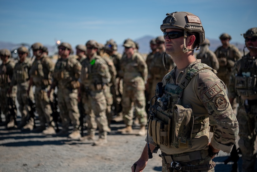 Airmen from the Kentucky Air National Guard’s 123rd Contingency Response Group attend a change-of-command ceremony at Amedee Army Airfield, Calif., Aug. 26, 2024. The ceremony took place at the end of a week-long exercise that tested the 123rd CRG’s capability to conduct a Joint Task Force-Port Opening, an operation designed to safely and effectively distribute cargo and supplies to austere areas affected by catastrophic events or conflict. (U.S. Air National Guard photo by Master Sgt. Joshua Horton)