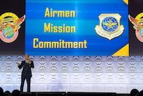 U.S. Air Force Gen. Johnny Lamontagne, Air Mobility Command commander, speaks to nearly 1000 Airmen during the 56th Annual Airlift/Tanker Association Symposium, Oct. 31, 2024, in Grapevine, Texas. Lamontagne kicked off the symposium introducing his commander’s intent and bucketing it into three focus areas: Airmen, mission, and commitment. (U.S. Air Force photo by Staff Sgt. Dalton Williams)