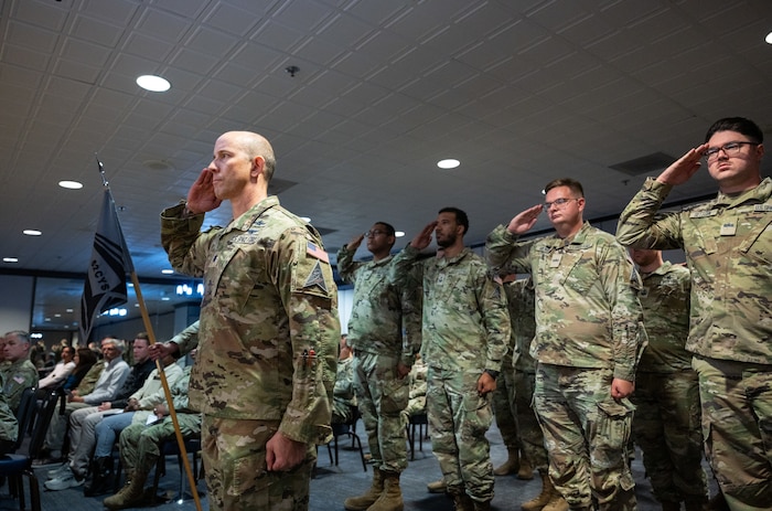 Servicemembers from the 82nd Cyberspace Systems Squadron render a first salute to U.S. Space Force Col. Raj Agrawal, Mission Delta 2 commander, during the MD 2 redesignation ceremony, Oct. 31, 2024. Mission Deltas oversee all aspects of mission area functions – people, training, equipment and combat sustainment.
