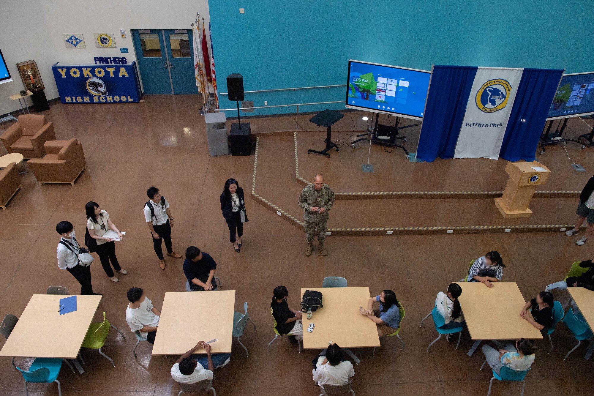 Air Force leadership gives a speech to students.