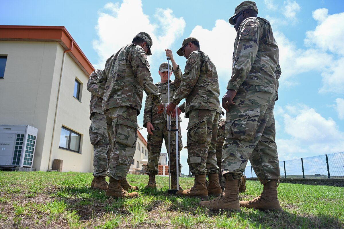 Airmen test soil strength.
