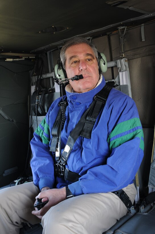 Kentucky's Lt. Gov. Jerry Abramson surveys the widespread damage caused by powerful storms over Laurel, Ky., from a Kentucky Guard UH-60 Black Hawk helicopter March 3.