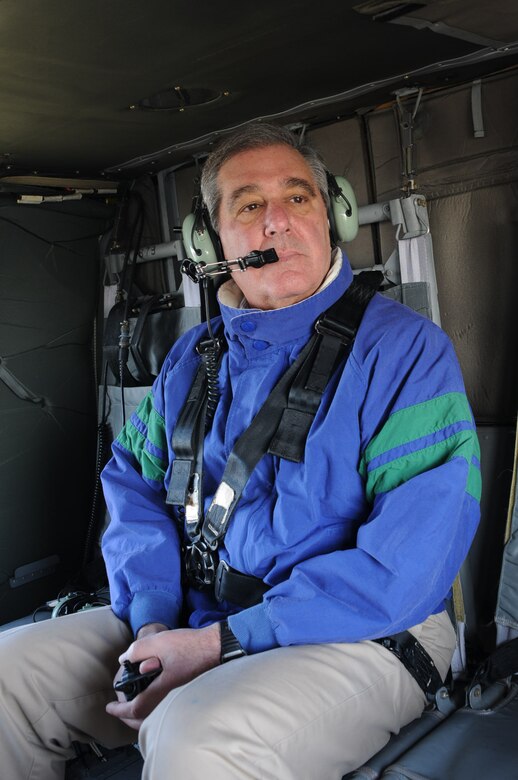 Kentucky's Lt. Gov. Jerry Abramson surveys the widespread damage caused by powerful storms over Laurel, Ky., from a Kentucky Guard UH-60 Black Hawk helicopter March 3.