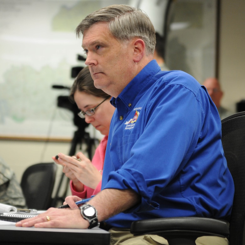 Kentucky National Guard Brig. Gen. John Heltzel, director of Kentucky Emergency Management, receives updates on critical information, March 3, surrounding recovery and relief efforts following severe weather and tornadoes, March 2.