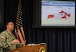 Kentucky National Guard Col. Charles K. Harris, J2 Intelligence and Security officer, briefs the Kentucky Emergency Management at the Emergency Operations Center at Boone National Guard Center, March 3, following tornadoes and storms that ripped through Kentucky, March 2.