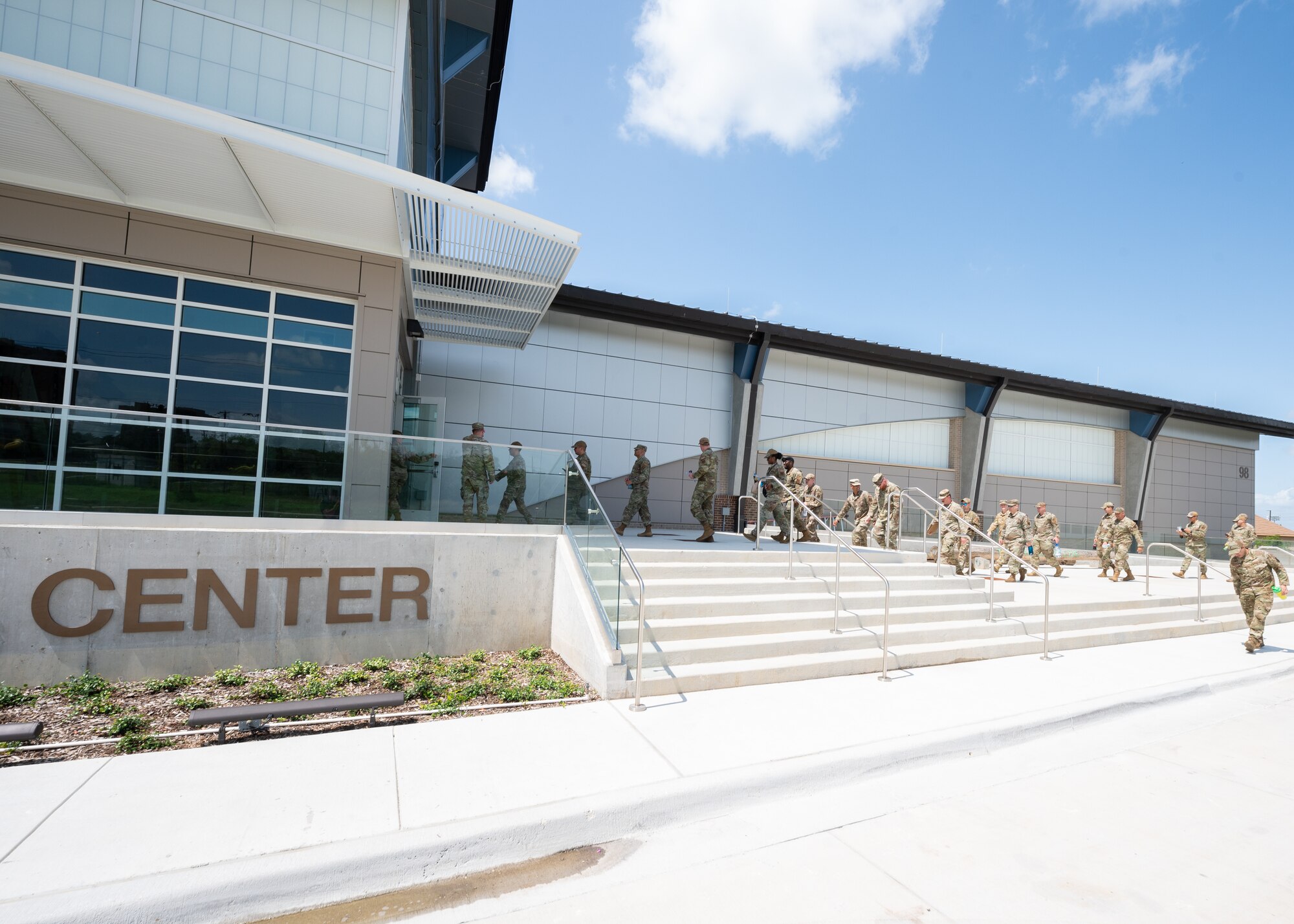 Recruiters enter an aquatic center