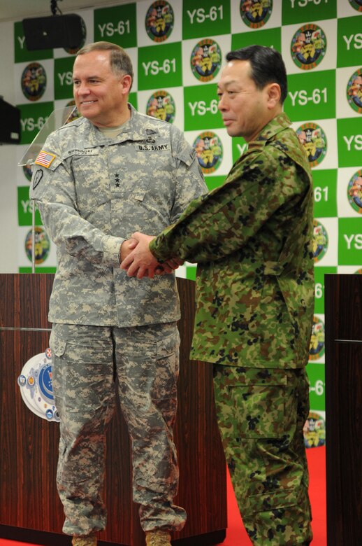 U.S. Army Pacific Commander Lt. Gen. Francis Wiercinski and Middle Army Commander of the Japan Ground Self Defense Force Lt. Gen. Ryuichiro Arakawa shake hands during the bilateral press conference Yama Sakura 61 Jan. 30.