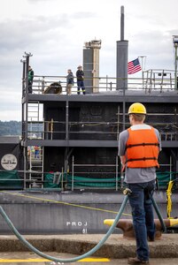 USS Jimmy Carter (SSN 23) enters Dry Dock 6 at Puget Sound Naval Shipyard & Intermediate Maintenance Facility, Aug. 21, 2024, with the help of a team of Code 740, Riggers. Jimmy Carter will now begin a Docking Continuous Maintenance Availability at the shipyard in Bremerton, Washington. (U.S. Navy photo by Wendy Hallmark)