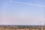 A rocket travels past an observation point during a joint strike exercise for Super Garuda Shield 2024 at Puslatpur 5, Indonesia, Aug. 31, 2024.