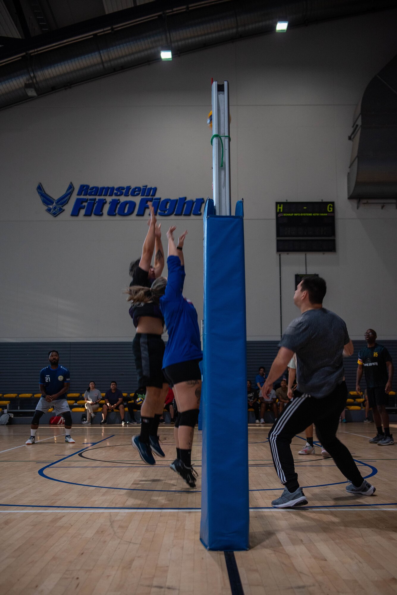 People playing volleyball.
