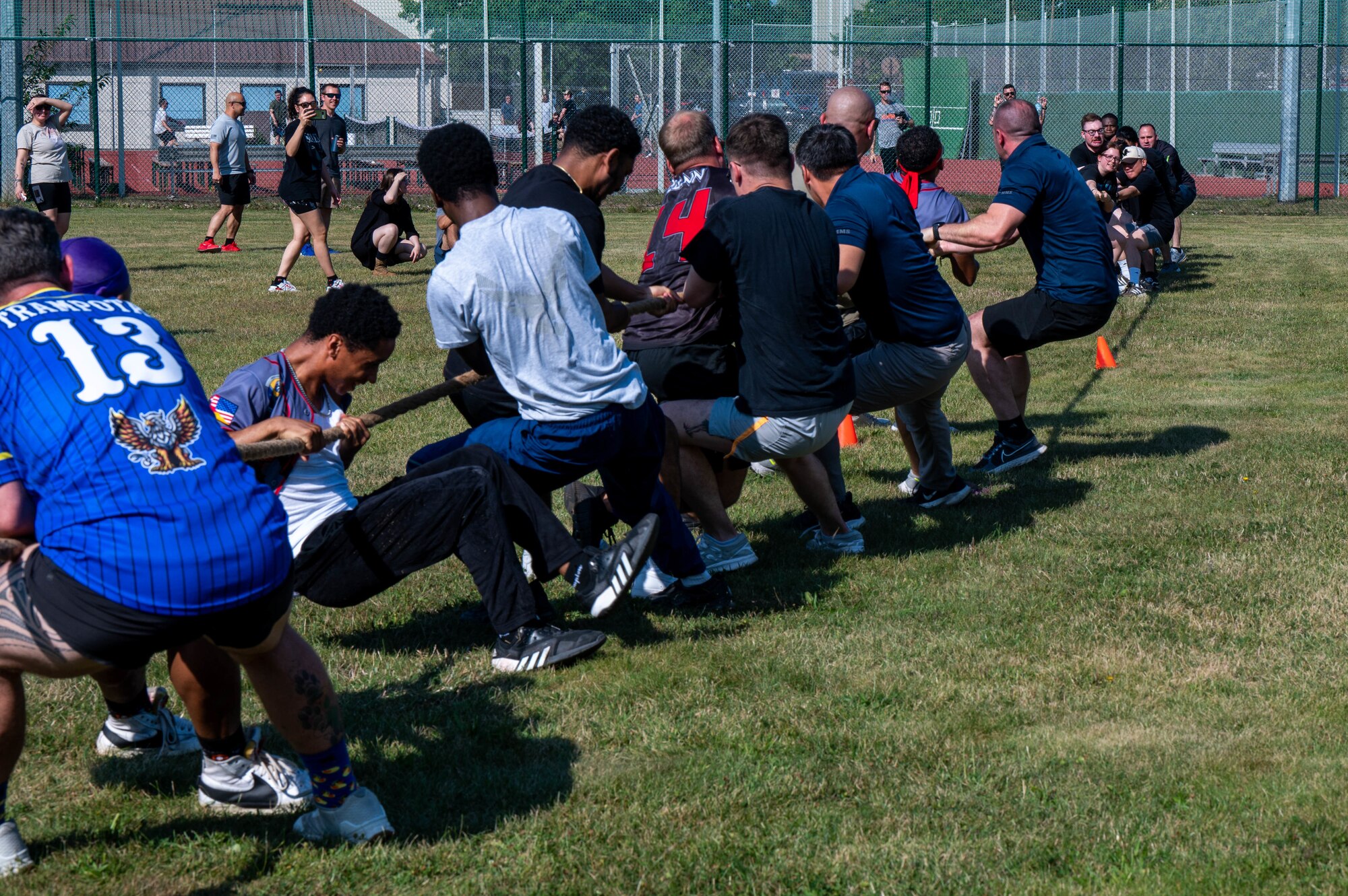 People playing tug of war.
