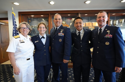 Second Lieutenants Kennedy Maddock and Christian Mou pose with Vice Admiral Joanna Nunan, Lt. Col. Nicholas Passarella and Col. Edward Segura at the U.S. Merchant Marine Academy Reserve Commissioning Ceremony.