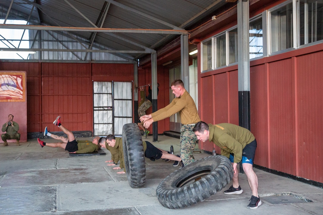 U.S. Marines with 1st Battalion, 24th Marine Regiment, 4th Marine Division, and members of the Armada de Chile, Cuerpo de Infantería de Marina (Chilean Marine Corps), conduct physical training exercises at Destacamento de Infanteria Marina Number 4 (Chilean Marine Detachment Number 4) “Cochrane”, Chile, during exercise UNITAS LXV, Sep. 3, 2024. The Marines conducted physical training to build camaraderie and esprit de corps, and maintain fitness standards.UNITAS focuses on strengthening our existing regional partnerships and encouraging the establishment of new relationships through the exchange of maritime mission-focused knowledge and expertise. (U.S. Marine Corps photo by Sgt. Gabriel Durand)