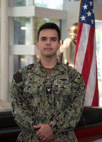 KINGS BAY, Ga. - Fire Control Technician 2nd Class David Bagby, stationed aboard USS Georgia (SSGN 729)(Blue), poses for a photo at the Trident Training Facility in Naval Submarine Base Kings Bay, Ga. Bagby attended the revamped Attack Weapons System (AWS) full-day session led by a uniformed and civilian team which allows guided-missile submarine (SSGN) Sailors a refreshed opportunity to share lessons learned; discuss challenges; and interface directly with industry partners, technical experts, and other fleet Sailors in a more collaborative way. (U.S. Navy photo by Mass Communication Specialist 1st Class Travis S. Alston/Released)
