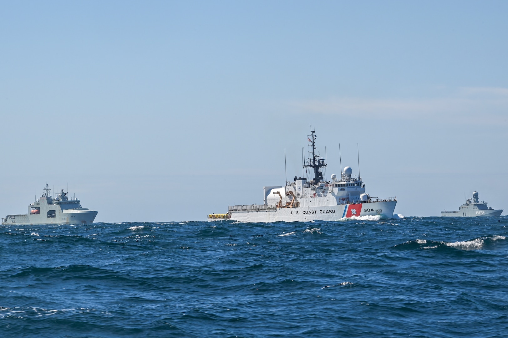 Coast Guard Cutter Northland (WMEC 904), center, Royal Canadian navy vessel HMCS Margaret Brooke (AOPV 431), left, and Royal Danish navy vessel HMDS Lauge Koch (P 572), right, perform a diamond formation, Aug. 13, 2024, while underway in the Atlantic Ocean. The three vessels performed various formations during a coordinated exercise. (U.S. Coast Guard photo by Petty Officer 3rd Class Anthony Randisi)