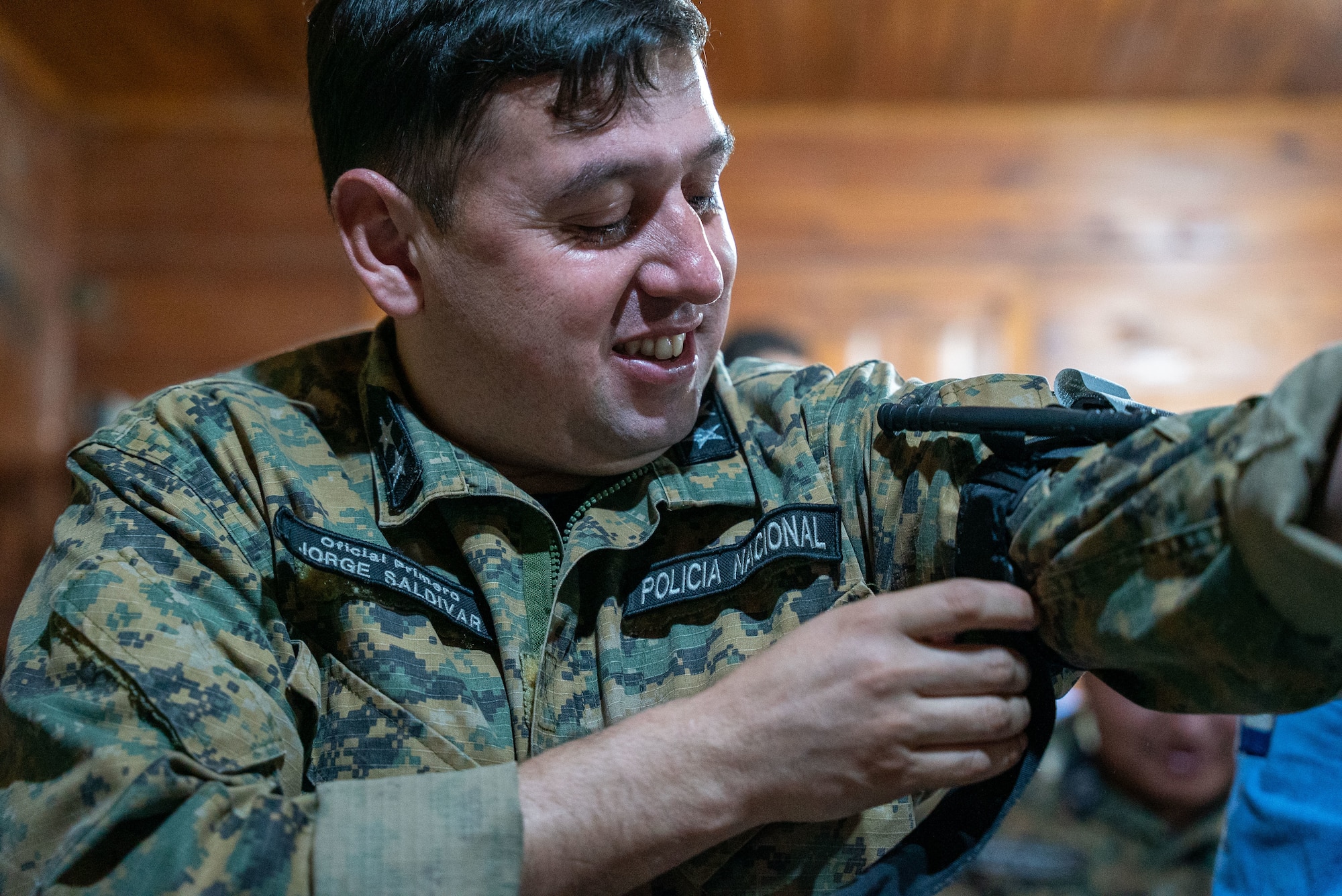 First Officer Jorge Saldívar, Paraguayan National Police of Boquerón head of intelligence, demonstrates how to apply a tourniquet during a Tactical Combat Casualty Care briefing in Filadelfia, Paraguay, Aug. 3, 2024. The Paraguayan National Police of Boquerón welcomed the AMISTAD 24 participants to a collaborative exchange, showcasing their best practices and fostering enhanced cooperation and understanding. (U.S. Air Force photo by Tech. Sgt. Carly Feliciano)