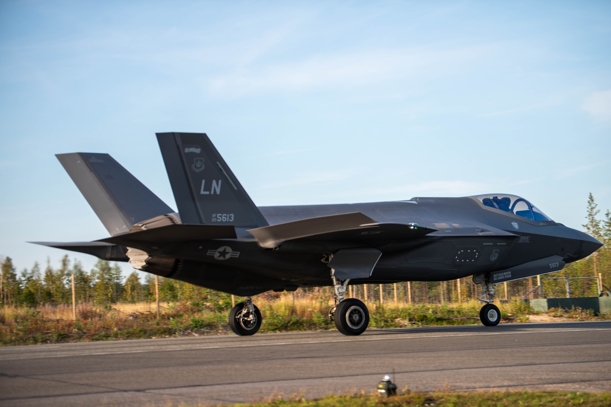 A U.S. Air Force F-35 Lightning II aircraft assigned to 48th Fighter Wing RAF, Lakenheath, U.K. lands during exercise BAANA 2024 on Hosio Highway strip, Ranua, Finland, Sept. 4. During the exercise two F-35 aircraft demonstrated landing and take off operations on a highway strip in Finland to practice Agile Combat Employment which increases the ability of our collective partners to collaborate and operate in a joint, high-intensity environment, improve readiness, responsiveness and interoperability. (U.S. Air Force photo by Airman 1st Class Tabatha Chapman)