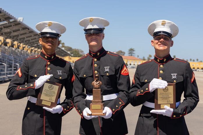 New U.S. Marine Corps honor graduates with Golf Company, 2nd Recruit Training Battalion, pose for a photo after a graduation ceremony at Marine Corps Recruit Depot San Diego, California, Aug. 23, 2024. Graduation takes place at the end of the 13-week transformation process, which includes training for drill, marksmanship, basic combat skills, and Marine Corps customs and traditions. (U.S. Marine Corps photo by Lance Cpl. Janell B. Alvarez)