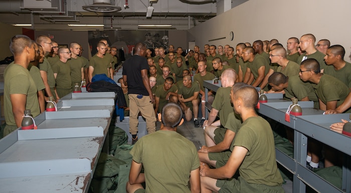 U.S. Marine Corps recruits with Bravo Company, 1st Recruit Training Battalion, are given instructions during their initial uniform fitting at Marine Corps Recruit Depot San Diego, California, Aug. 21, 2024. Recruits are fitted twice during recruit training, once on training day 27, and Marine day six, to ensure their uniforms are ready to be worn properly as Marines. (U.S. Marine Corps photo by Lance Cpl. Janell B. Alvarez)