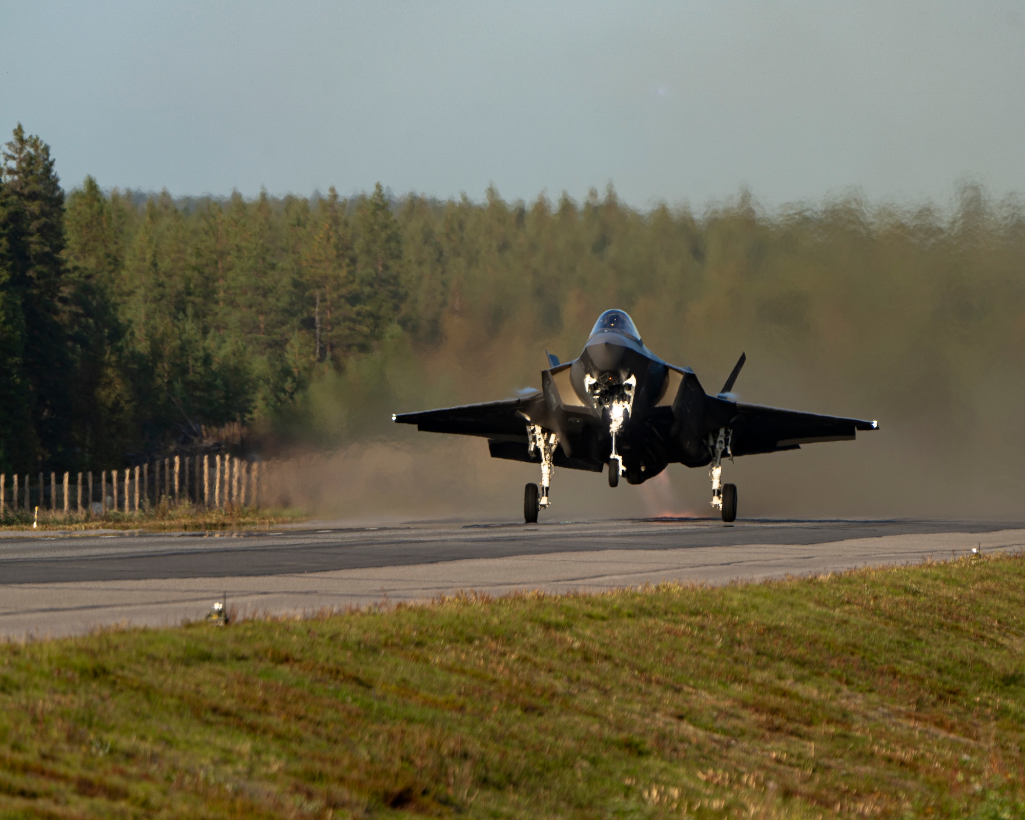 Two U.S. Air Force F-35 Lightning II aircraft assigned to the 48th Fighter Wing, RAF Lakenheath, U.K., demonstrate landing and takeoff operations during exercise BAANA 2024, Sept. 4, on Hosio Highway Strip, Ranua, Finland. During the exercise the aircraft landed on a highway strip in Finland to practice Agile Combat Employment which increases the ability of our collective partners to collaborate and operate in a joint, high-intensity environment, improve readiness, responsiveness and interoperability. (U.S. Army photo by Sgt. Scyrrus Corregidor)