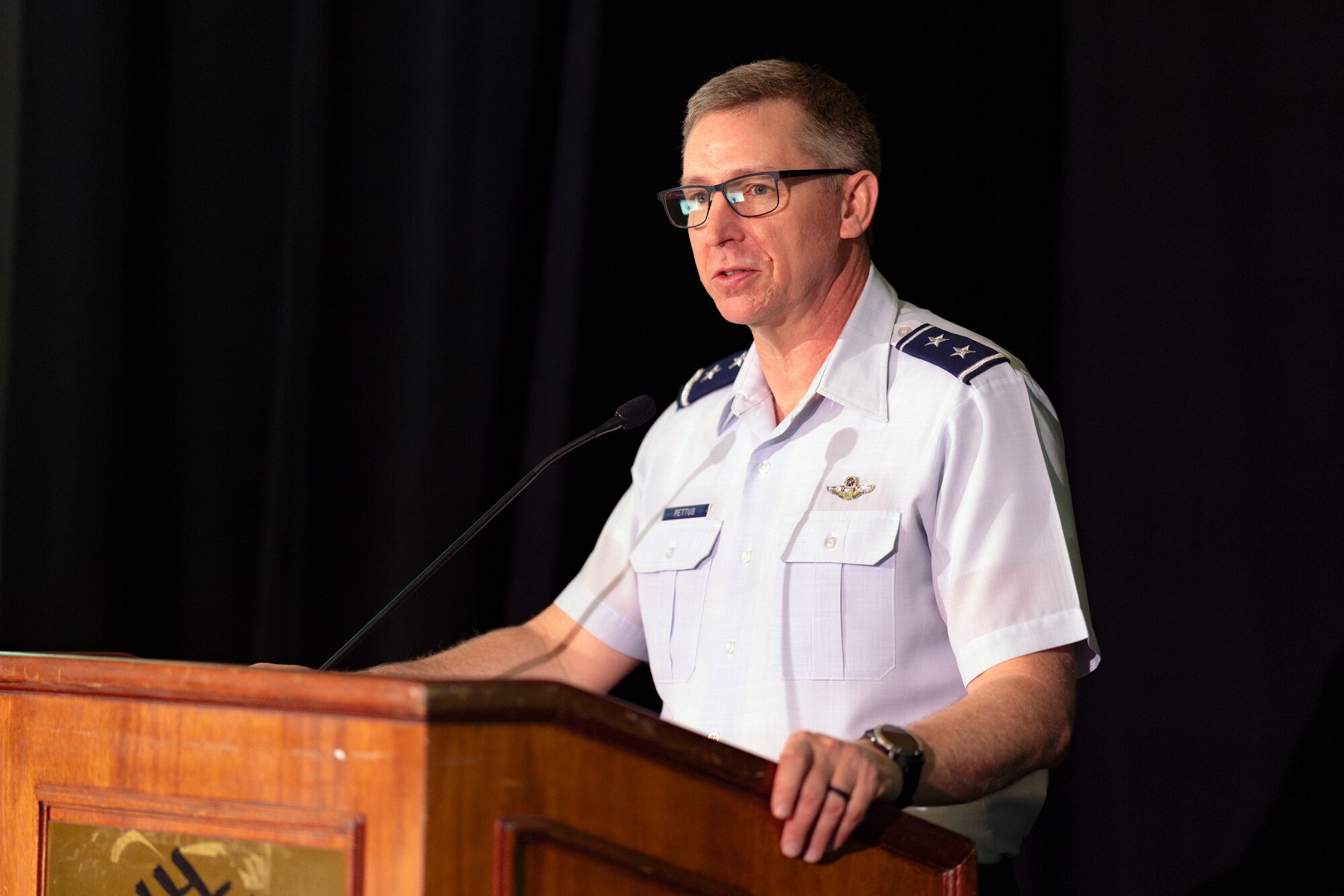 U.S. Air Force Maj. Gen. Evan Pettus, 12th Air Force (Air Forces Southern) commander, provides opening remarks during the Central American and Caribbean Air Chiefs conference in Tucson, Arizona, Aug. 26, 2024. The week-long conference united key Air Force leaders from 13 Central American and Caribbean partner nations to work collaboratively to address future challenges and share best practices. (U.S. Air Force photo by Tech. Sgt. Rachel Maxwell)