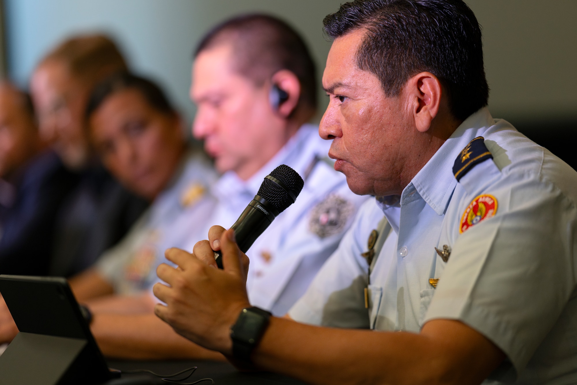 El Salvador Air Force Col. Pablo Alberto Soriano Cruz speak on a panel during the Central American and Caribbean Air Chiefs conference in Tucson, Arizona, Aug. 26, 2024. The week-long conference united key Air Force leaders from 13 Central American and Caribbean partner nations to work collaboratively to address future challenges and share best practices. (U.S. Air Force photo by Tech. Sgt. Rachel Maxwell)