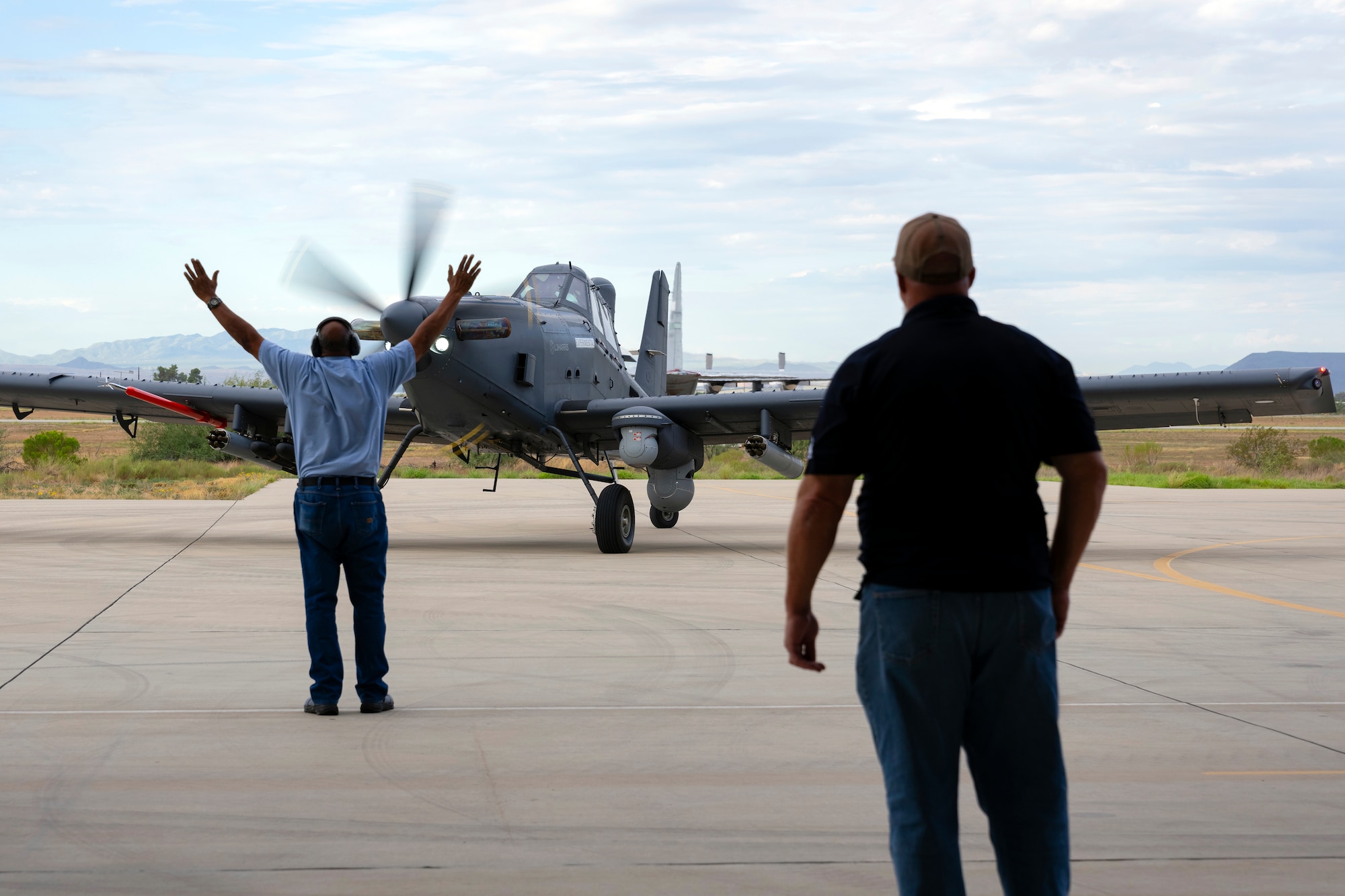 An OA-1K Skyraider II “Air Tractor” is marshalled into a hangar for the Central American and Caribbean Air Chiefs conference—Industry Day at Davis-Monthan Air Force Base, Arizona, Aug. 27, 2024. Industry Day afforded air chiefs an opportunity to collaborate with eight industry partners on relevant technology solutions tailored to their specific needs and served as a starting point for potential future acquisitions. (U.S. Air Force photo by Tech. Sgt. Rachel Maxwell)
