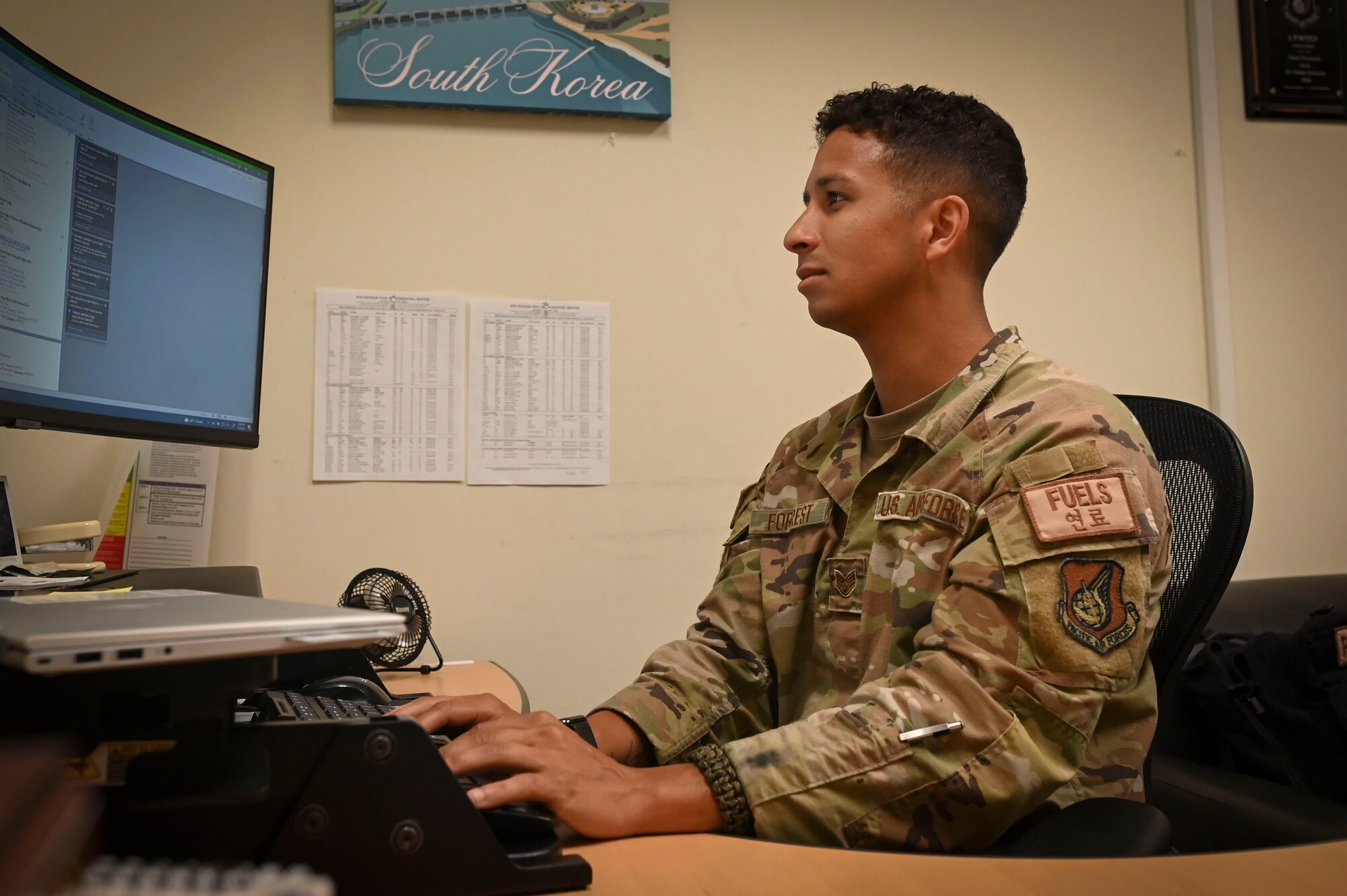 Staff Sgt. Bryson Forrest, 8th Fighter Wing noncommissioned officer in charge of protocol, reviews and edits an itinerary.