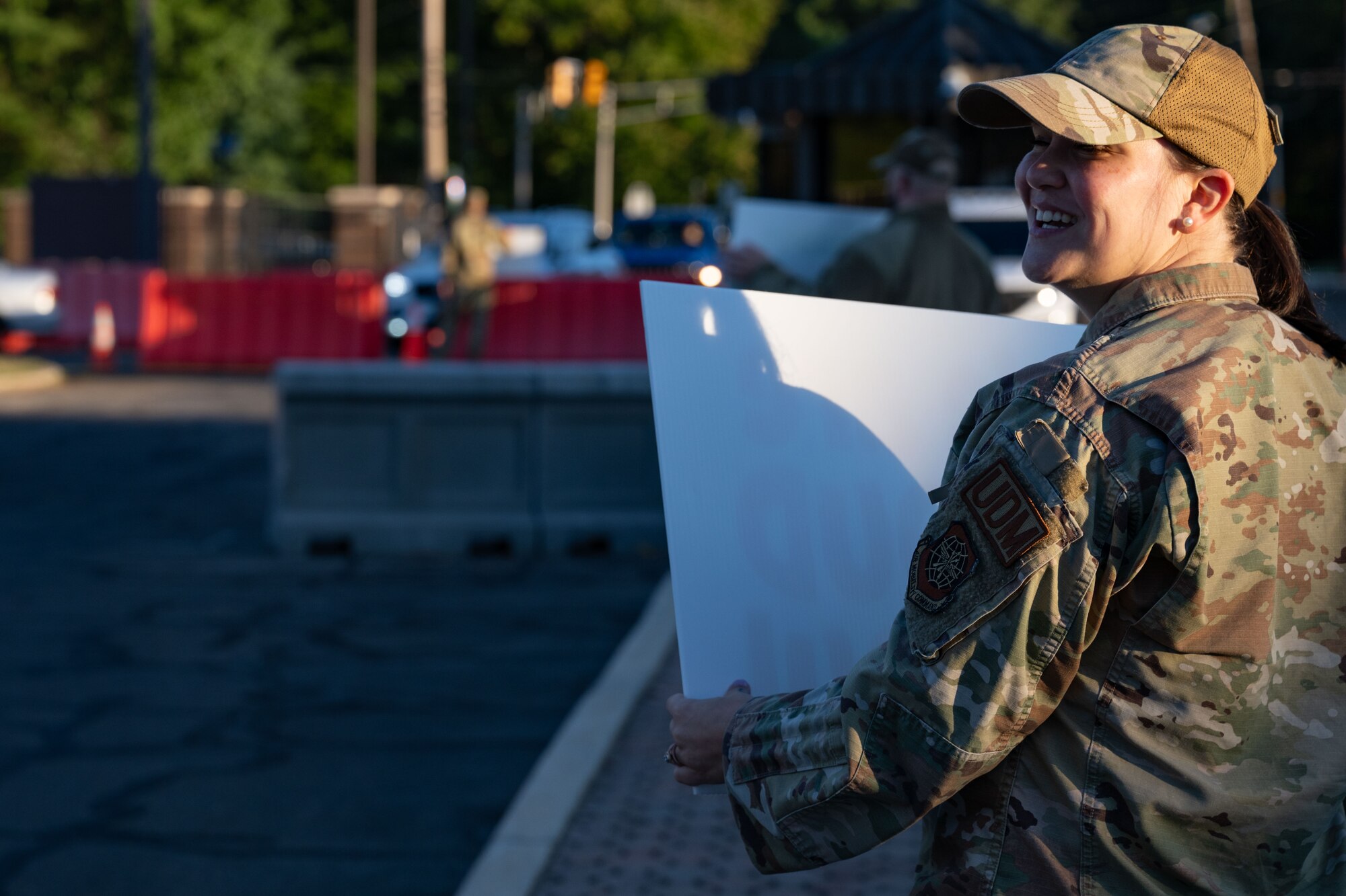 A U.S. Air Force Airmen holds up an encouraging sign during a National Suicide Prevention Awareness Month event at Joint Base McGuire-Dix-Lakehurst, N.J., Sept. 3, 2024. The month of September is the National Suicide Prevention Awareness Month where many organizations make a concerted effort to destigmatize the mental health struggles that many may face and take the opportunity to educate the public on recognizing signs someone is need of support as well as the avenues to receive support. (U.S. Air Force photo by Staff Sgt. Monica Roybal)