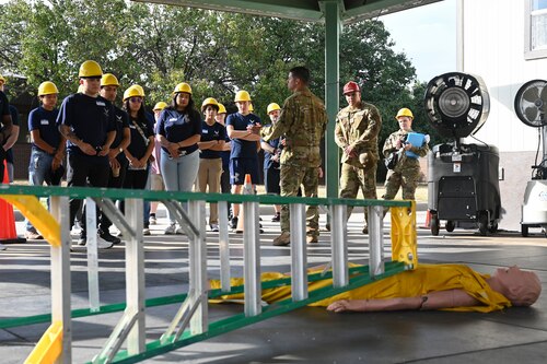 U.S. Air Force prospects learn about the different blocks of training for fire protection specialists at the Louis F. Garland Department of Defense Fire Academy, Goodfellow Air Force Base, Aug. 28, 2024. The tour offered the aspiring service members a firsthand perspective on the training, daily operations and career opportunities. (U.S. Air Force photo by Airman 1st Class Madi Collier)