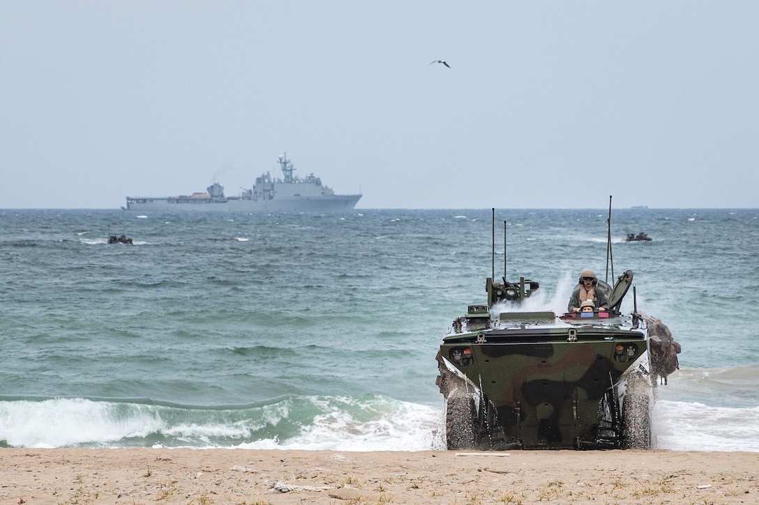 A U.S. Marine Corps Amphibious Combat Vehicle attached to Alpha Company, Battalion Landing Team 1/5, 15th Marine Expeditionary Unit, lands at Hwajin-ri, South Korea, Sept. 2, 2024, during a simulated amphibious assault as part of exercise Ssang Yong 24. Exercise SY24 strengthens the Republic of Korea-U.S. Alliance through bilateral, joint training, contributing toward combined amphibious capability in defense of the Korean Peninsula. (U.S. Marine Corps photo by Cpl. Amelia Kang)