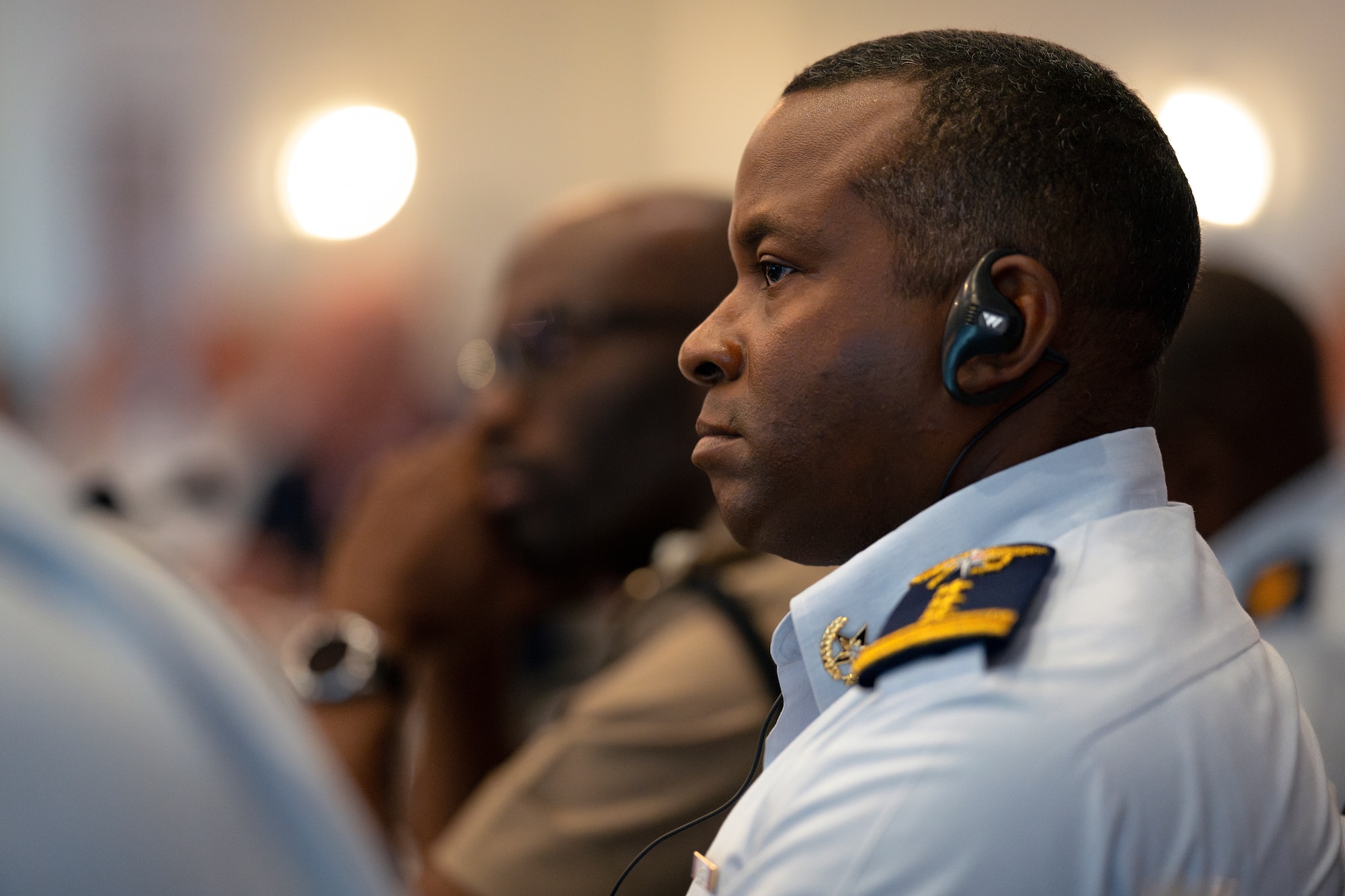 Panamanian National Aeronaval Service Comisionado Samuel Welsh Moreno listens to a briefing during the Central American and Caribbean Air Chiefs conference in Tucson, Arizona, Aug. 26, 2024. Formal briefings and discussions were held under the theme—Partnership to strengthen cooperative, capable forces to address evolving regional threats. (U.S. Air Force photo by Tech. Sgt. Rachel Maxwell)
